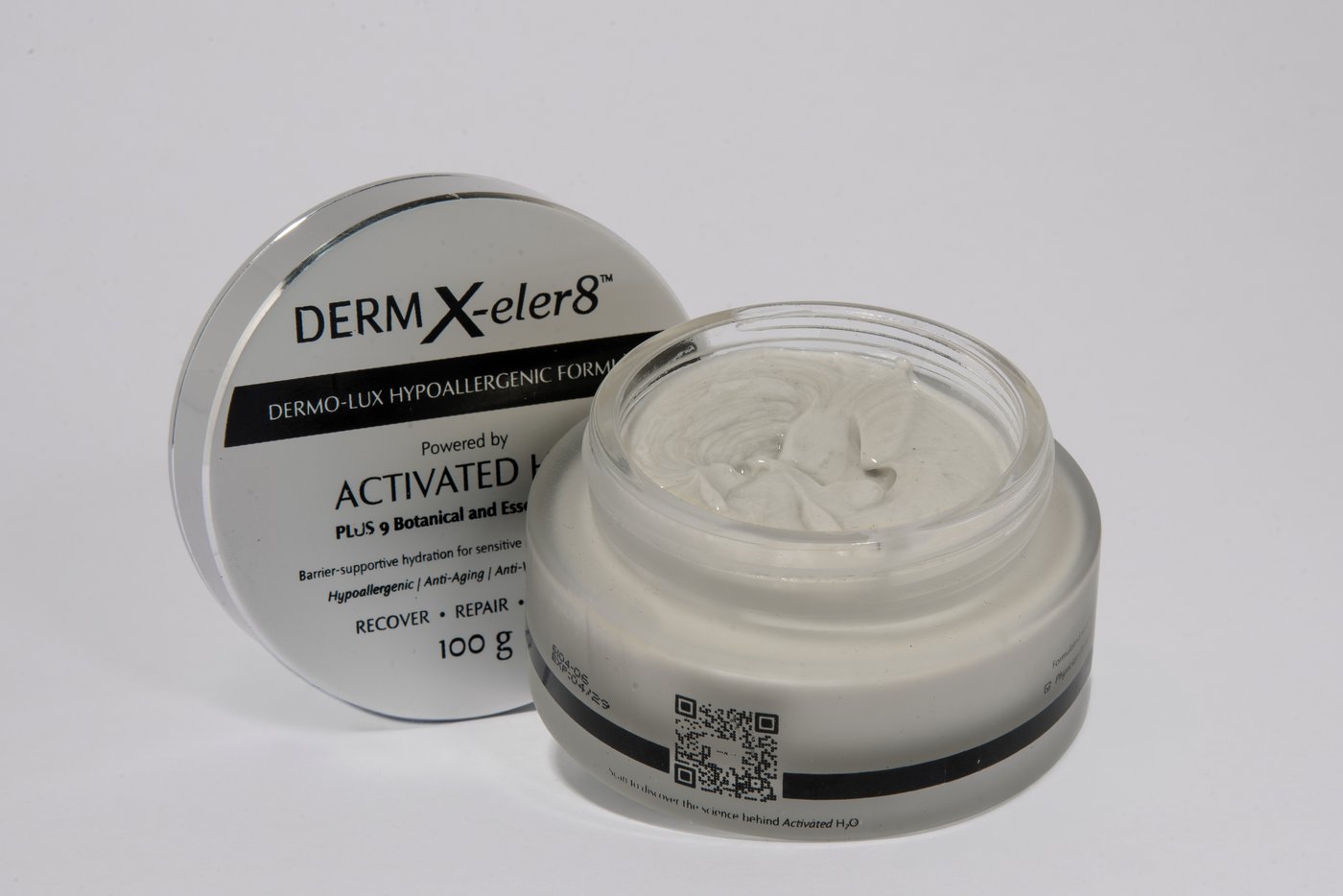 Derm X-eler8 jar lid and open jar showing cream texture